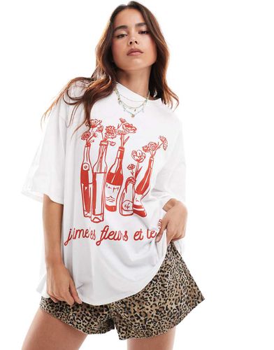 T-shirt oversize bianca con grafica con bottiglie di vino e fiori - ASOS DESIGN - Modalova