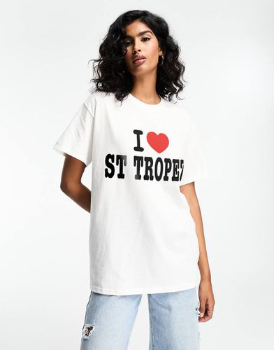 T-shirt oversize bianca con stampa grafica "I heart St Tropez" - ASOS DESIGN - Modalova