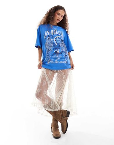 T-shirt oversize con stampa indie "Los Angeles" con borchie - ASOS DESIGN - Modalova