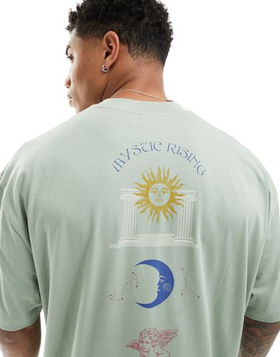 T-shirt oversize color chiaro con stampa celestiale in verticale sul retro - ASOS DESIGN - Modalova