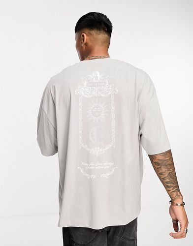 T-shirt oversize color con stampa celestiale sul retro - ASOS DESIGN - Modalova