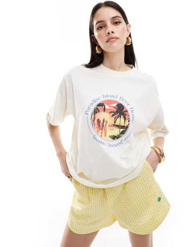 T-shirt oversize crema con grafica "Paradise Island Beer" - ASOS DESIGN - Modalova