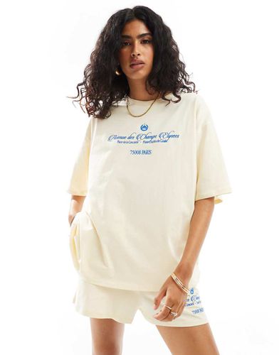 T-shirt oversize gialla con grafica "Champs Elysees" in coordinato - ASOS DESIGN - Modalova