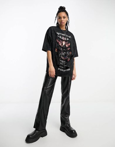 T-shirt oversize nera con grafica rock effetto intaglio con applicazioni a caldo - ASOS DESIGN - Modalova