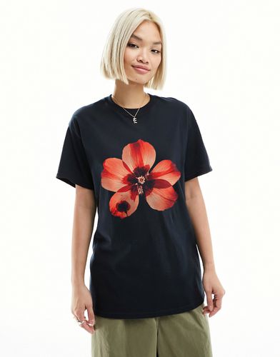 T-shirt oversize nera con stampa di fiore pressato - ASOS DESIGN - Modalova