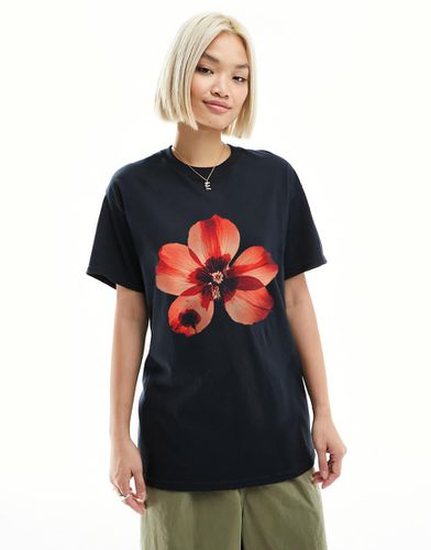 T-shirt oversize nera con stampa di fiore pressato - ASOS DESIGN - Modalova