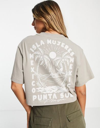 T-shirt squadrata color sabbia slavato con grafica stampata "Isla Mujeres" - ASOS DESIGN - Modalova