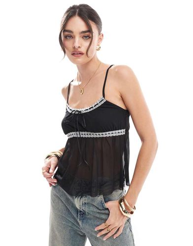 Top a canottiera nera vaporosa - ASOS DESIGN - Modalova