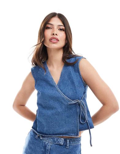 Top in denim medio a portafoglio - ASOS DESIGN - Modalova