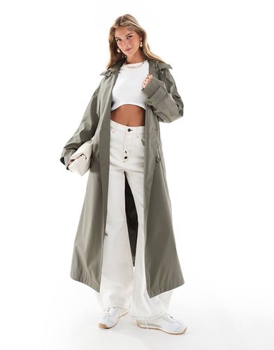 Trench gommato antipioggia kaki con cintura e cappuccio - ASOS DESIGN - Modalova