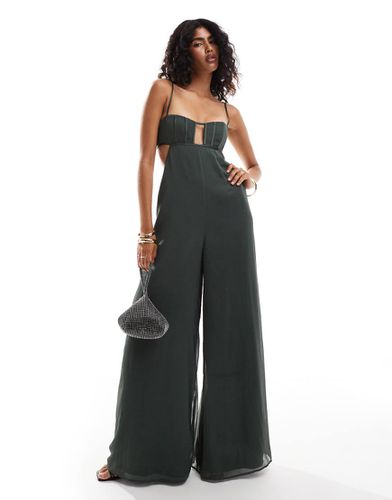 Tuta jumpsuit a fondo ampio verde in chiffon e raso con dettaglio stile corsetto e cut-out - ASOS DESIGN - Modalova