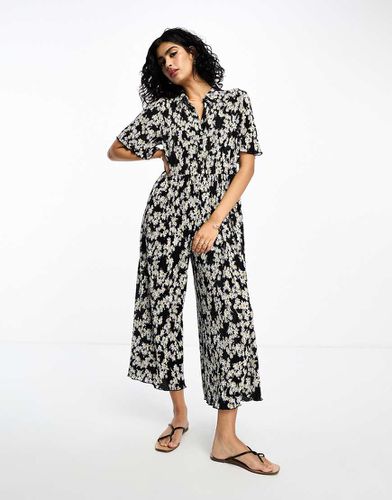 Tuta jumpsuit a punto smock plissé con colletto nera a fiori - ASOS DESIGN - Modalova