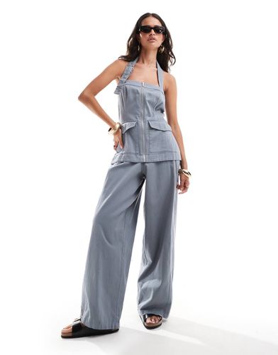 Tuta jumpsuit allacciata al collo multitasche grigia in twill - ASOS DESIGN - Modalova