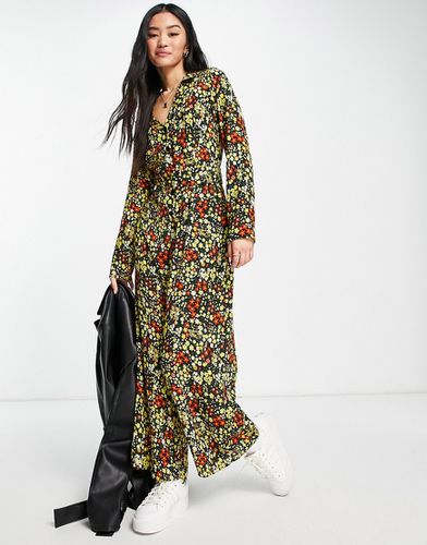 Tuta jumpsuit da giorno color senape a fiori con cintura e colletto anni '70 in crêpe a bolle - ASOS DESIGN - Modalova