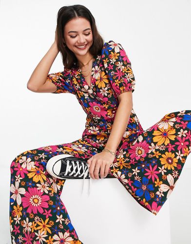 Tuta jumpsuit in crêpe a bolle a fiorellini con maniche a sbuffo - ASOS DESIGN - Modalova