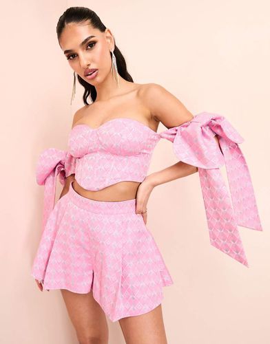 Top a fascia stile corsetto in jacquard con stampa e fiocchi sulle maniche in coordinato - ASOS Luxe - Modalova