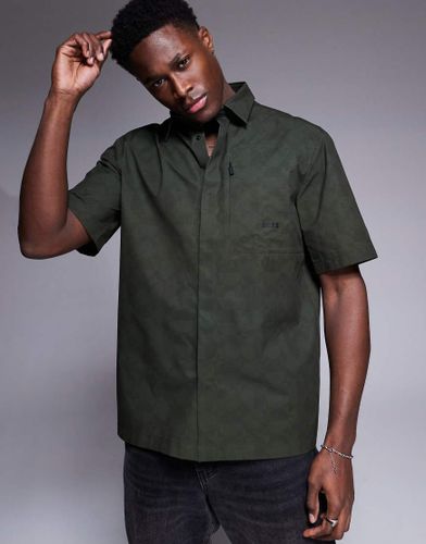 Bechno - Chemise technique décontractée à manches courtes et imprimée sur l'ensemble - foncé - Boss Green - Modalova