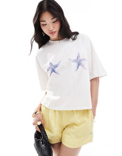 T-shirt oversize bianca con stampa di stelle - Bershka - Modalova