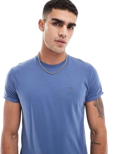 T-shirt basic con maniche risvoltate - Bershka - Modalova