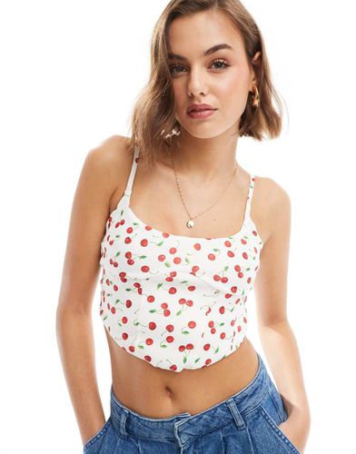 Top a corsetto con stampa di ciliegie - Bershka - Modalova