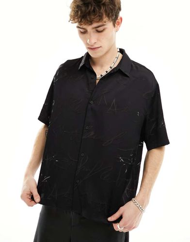 Camicia in raso nera con ricamo tono su tono - Bershka - Modalova