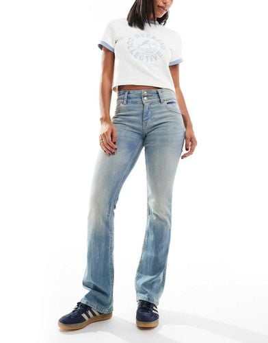 Jeans bootcut a vita bassa lavaggio azzurro sporco - Bershka - Modalova