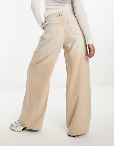 Jeans con fondo ampio color sabbia slavato - Bershka - Modalova