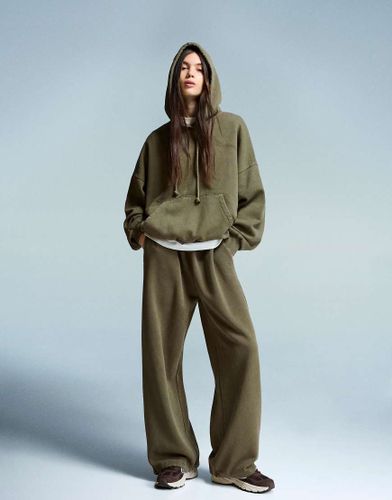 Pantalon de jogging duveteux à stoppers - Kaki - Bershka - Modalova