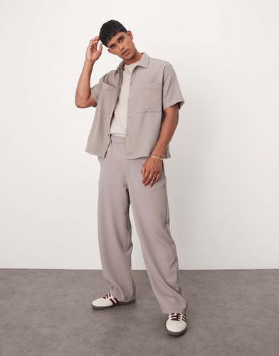 Pantaloni plissé a fondo ampio marrone chiaro in coordinato - Bershka - Modalova