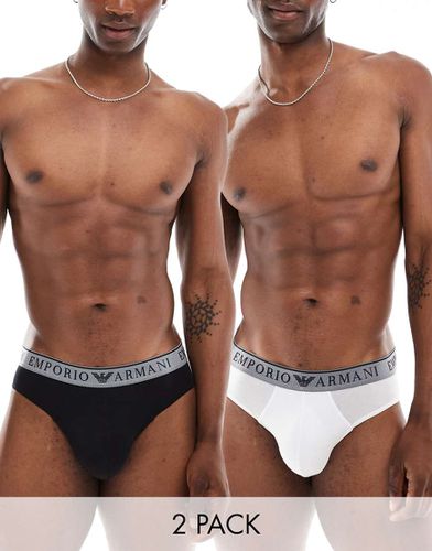 Emporio Armani - Bodywear - Confezione da 2 slip neri e bianchi con fascia in vita con logo - Armani Exchange - Modalova