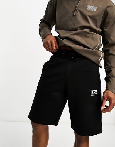 Emporio Armani - Core - Pantaloncini neri in jersey con stemma - EA7 - Modalova