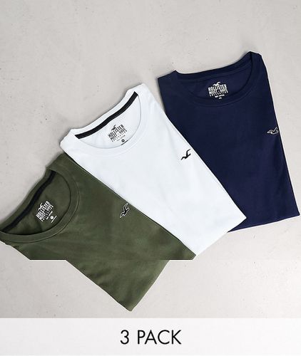 Confezione da tre t-shirt blu navy, verde e blu con logo a icona - Hollister - Modalova