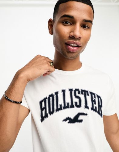 T-shirt bianca con logo stile college - Hollister - Modalova