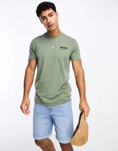 Tech - T-shirt attillata mélange con logo piccolo - Hollister - Modalova