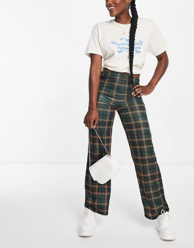 Pantaloni con fondo ampio a vita alta verdi a quadri in coordinato - Heartbreak - Modalova
