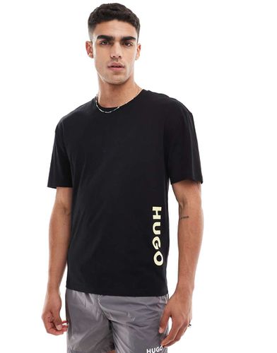 HUGO Swimwear - T-shirt comoda nera con logo - BOSS Bodywear - Modalova