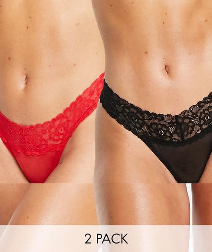 Ivory Rose - Confezione da 2 perizomi in rete con finiture in pizzo nero e rosso - Ivory Rose Lingerie - Modalova