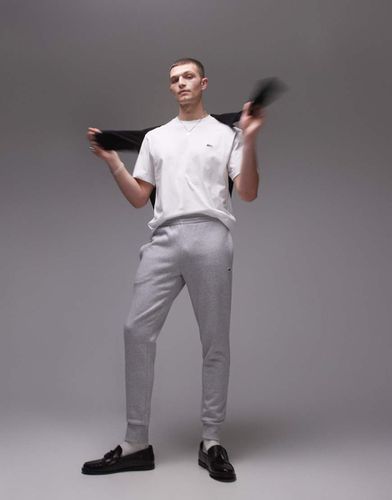 Pantaloni della tuta slim grigi con logo - Lacoste - Modalova