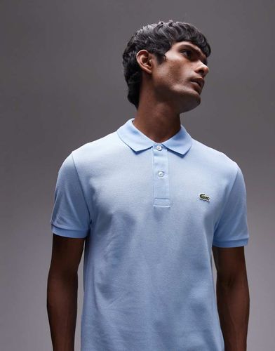 Polo in piqué azzurro slim con logo - Lacoste - Modalova