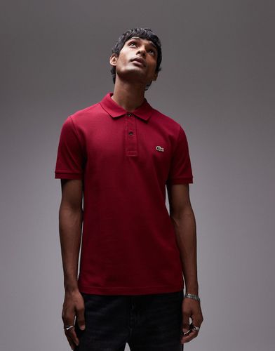 Polo slim in piqué bordeaux con logo - Lacoste - Modalova