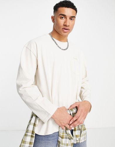 T-shirt color crema a maniche lunghe con logo piccolo e tasca - Levi's - Modalova