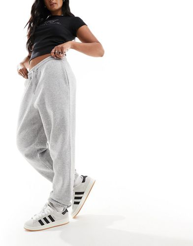 Joggers mélange con fondo elaticizzato - Monki - Modalova