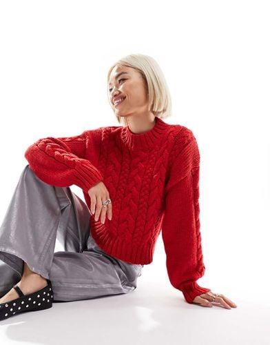 Maglione accollato in maglia rossa a trecce - Monki - Modalova