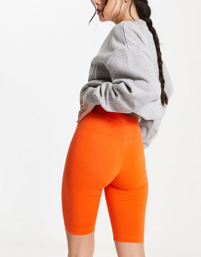 Pantaloncini leggings arancioni in coordinato - Monki - Modalova
