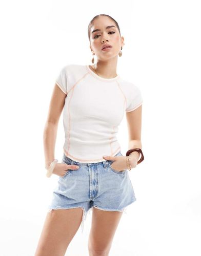 T-shirt ajusté effet rétréci à coutures contrastantes orange - Monki - Modalova