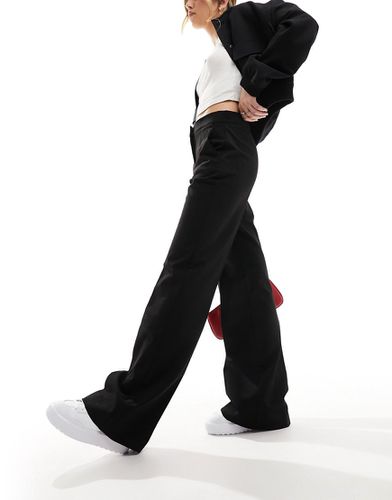 Pantaloni a fondo ampio neri con zip - Mango - Modalova
