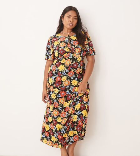 Anna - Robe mi-longue à fleurs vives avec manches évasées - Nobody's Child Plus - Modalova