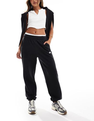 Sport Essentials - Joggers neri in french terry - New Balance - Modalova