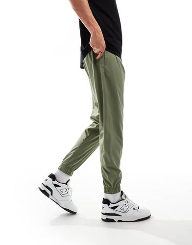 Sport Essentials - Joggers verdi - New Balance - Modalova