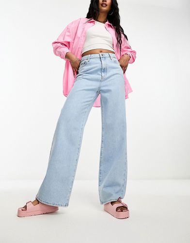 Jeans a vita alta con fondo ampio chiaro - New Look - Modalova